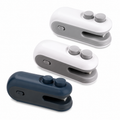 Portable mini bag sealer with compact handheld design for sealing snack bags and keeping food fresh.